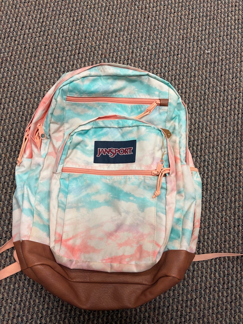 Jansport Pastel Tie-Dye Backpack in Aqua & Coral with Brown Base